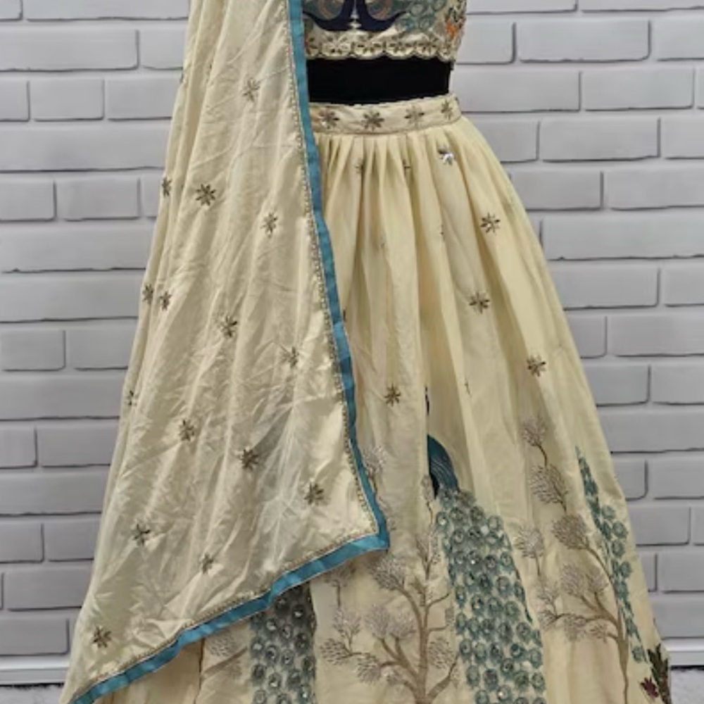 Elegant Cream and Blue Embroidered Lehenga